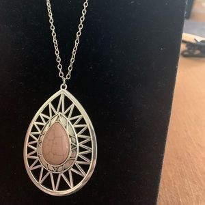 Silver necklace with brown center stone